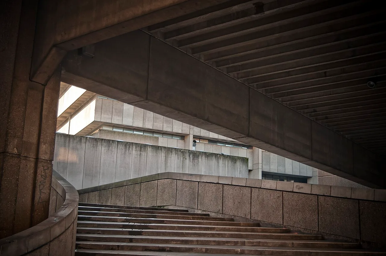 Raw concrete stair and soffit